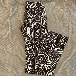 Brown and white print flare pants
